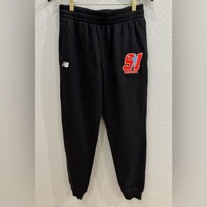 New Balance Black Fleece Pants with a red and blue "91 TRISTATE" logo.